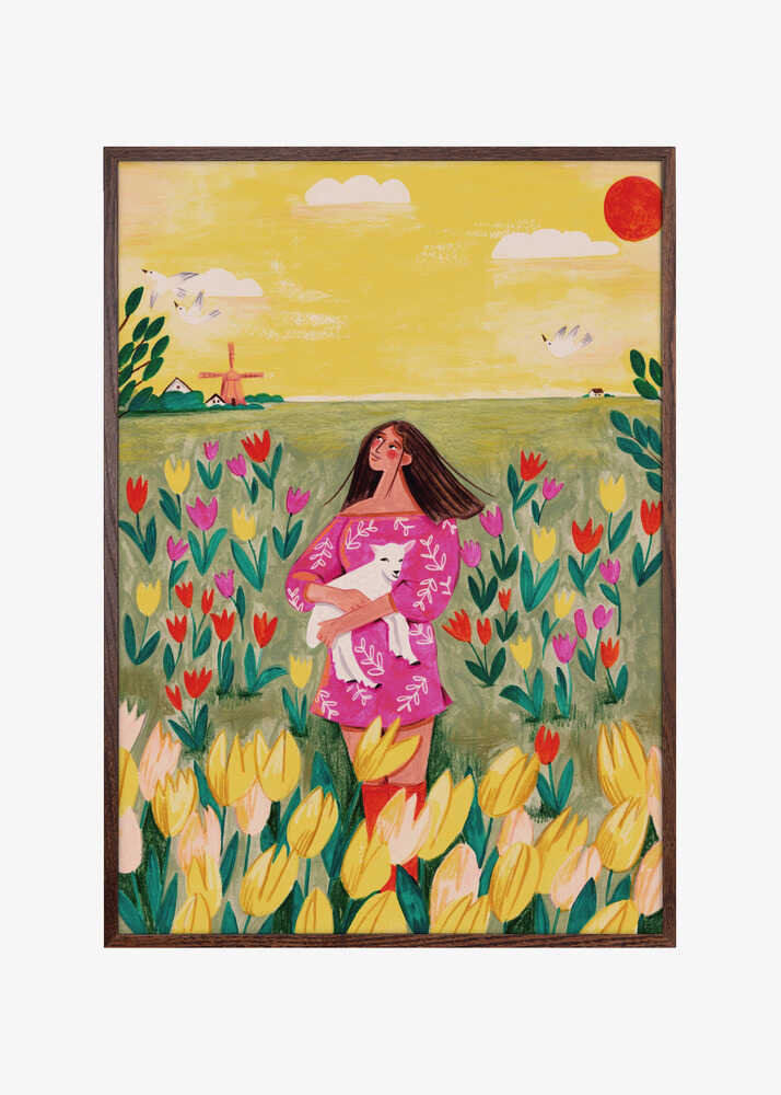 Woman in spring tulip field