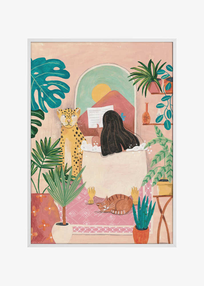 Woman taking bath in pink tropical bathroom